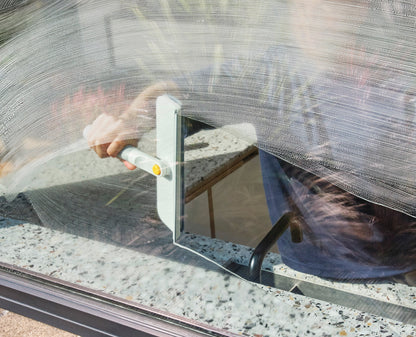 [hidden] [lifestyle] CleanTech™ 2-in-1 Glass Cleaning Tool with Replacement Pad